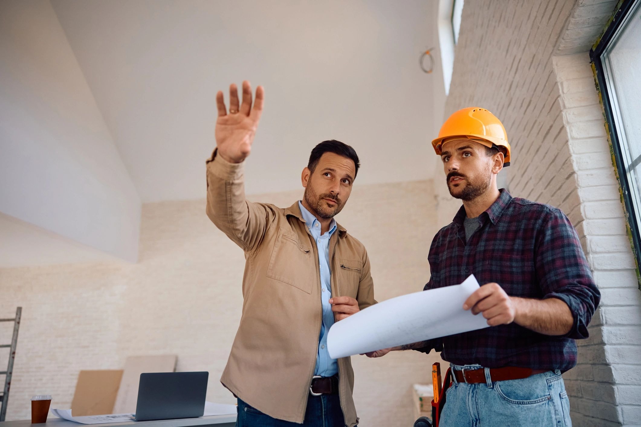 Westlake Remodeling contractors reviewing plans